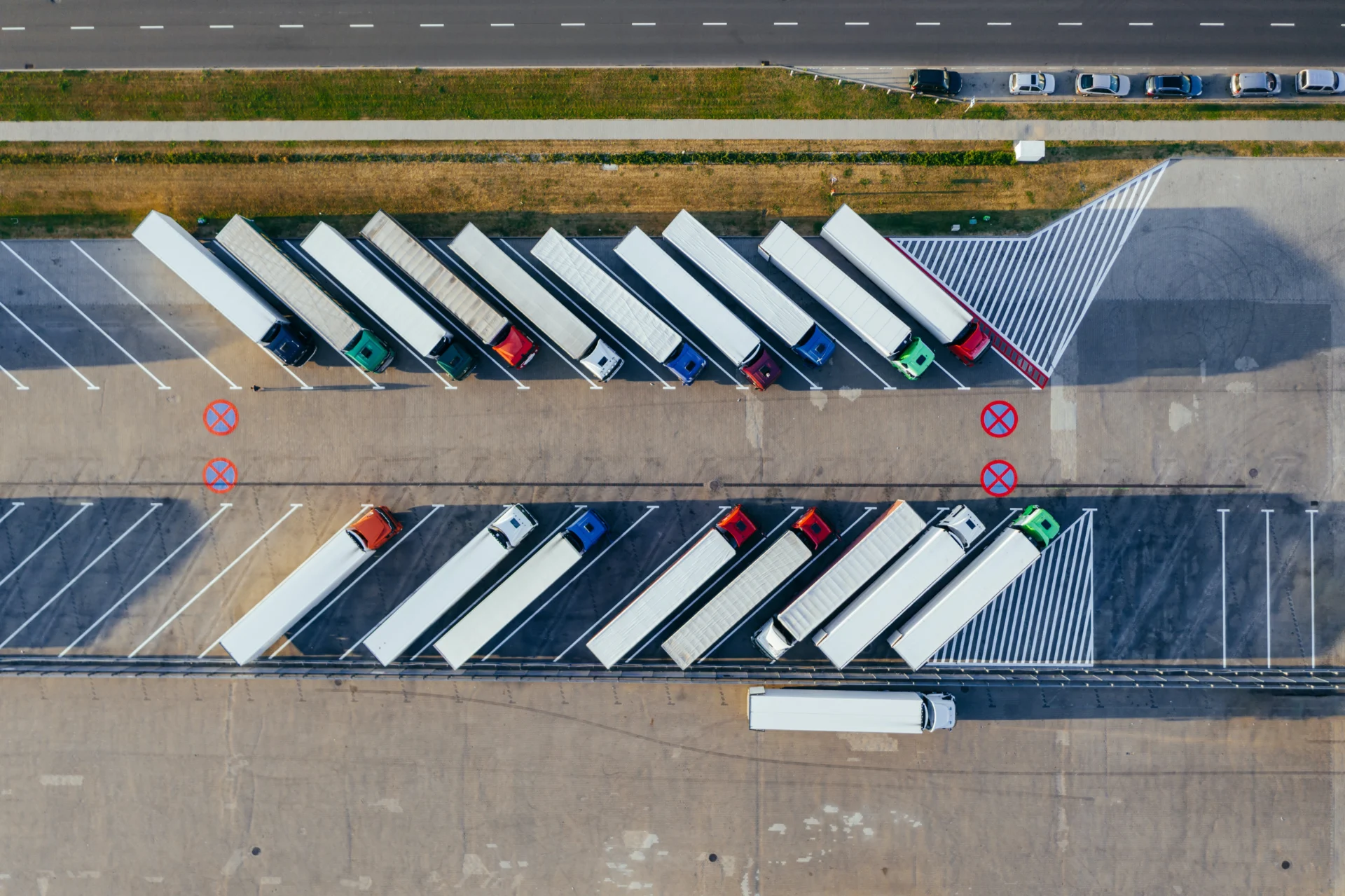 lots of trucks parked in parking